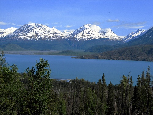 snow capped mountains and lake