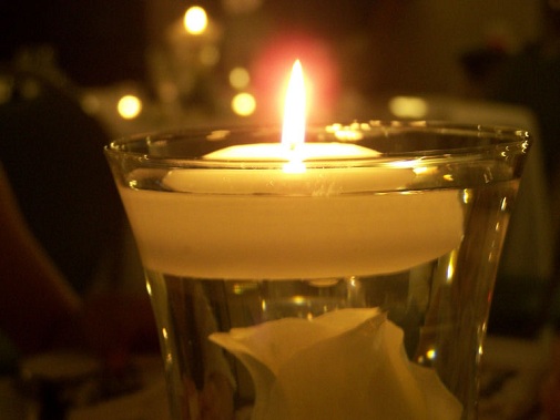 lit votive candle