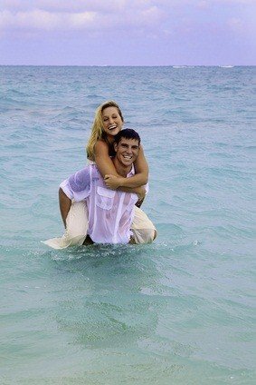 newlyweds in ocean