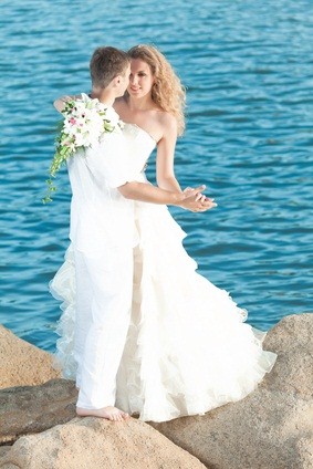 newlyweds by the ocean