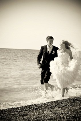 newlyweds on beach