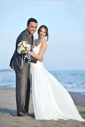 newlyweds on beach