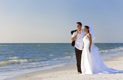 newlyweds by the ocean