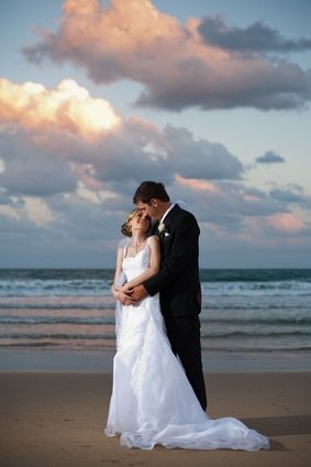 newlyweds on beach