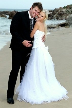 bride and groom at beach