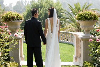 bride and groom in garden