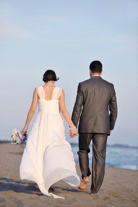 newlyweds on beach