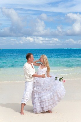 newlyweds on beach