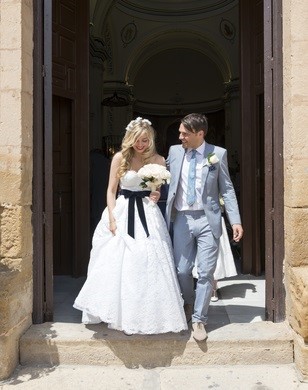 bride and groom coming out of church