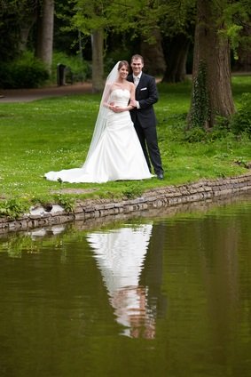 newlyweds by lake